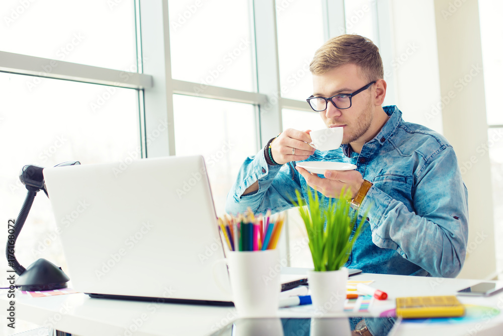 Poster web designer working on the best framework of a new application