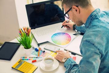 Web designer working on the best framework of a new application