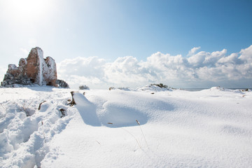 Uluzzo tower after a exceptional snowfall, Salento
