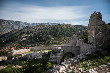 ruins of old town on hill over the new town 