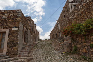 May 22, 2014 Real de Catorce, Mexico: while most of the town is still abandoned and in ruins, some of the stone buildings has been renovated and opened as hotels or hostels