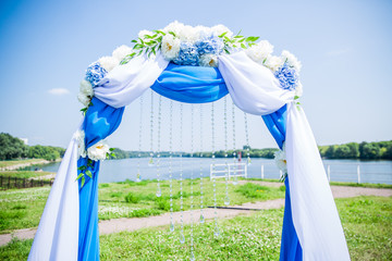 wedding arch decorated with peonies close-up