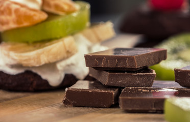 Chocolate,cream and fruits.Close-up shoot