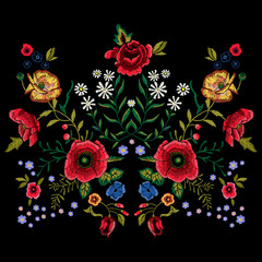 Embroidery traditional pattern with red poppies and roses.