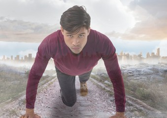 Man set and prepared to run with city transition
