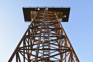 The old rusty water tower tilted