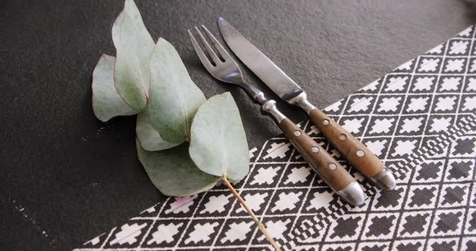 Various cutlery on table 