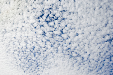 Cirrocumulus and altocumulus clouds and sky in summer