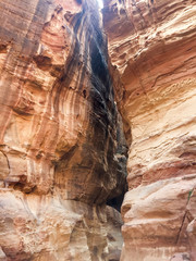 Al Siq passage to ancient Petra town. Rock-cut town Petra was established about 312 BC as the capital city of the Arab Nabataean