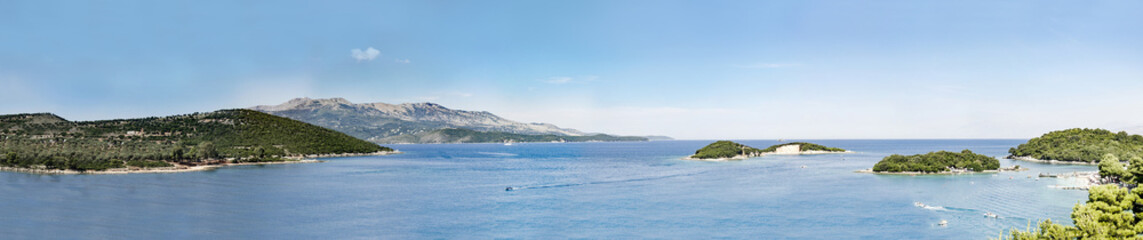 Fototapeta na wymiar Green island and sea nature landscape panorama