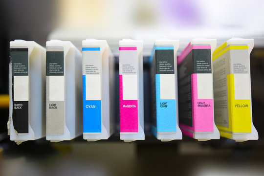 modern digital printing press, concept, closeup of the toner cartridges on large plotter printer
