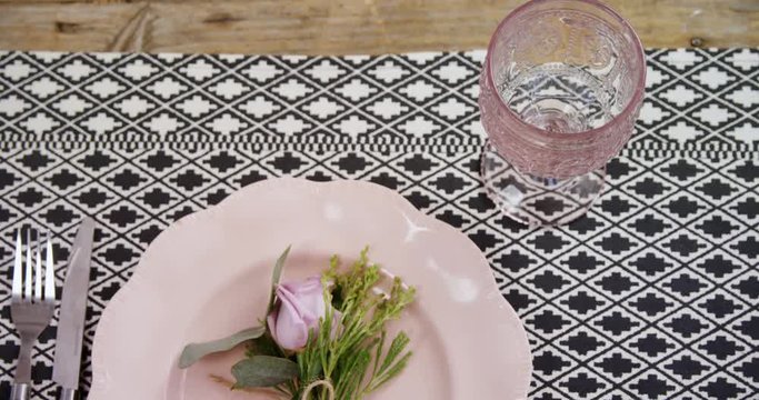 Various cutlery on wooden table 