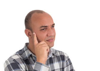 Fototapeta premium Half profile of man looking with doubt. Latin American hairless, isolated on white background..