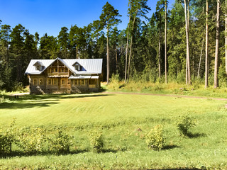 Fototapeta na wymiar Wooden House on forrest meadow in Valaam island, Ladoga lake, Karelia, Russia