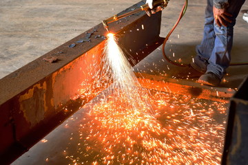 Welding sparks of beam steel from Welding technician or Sparks cut steel with fire gas.