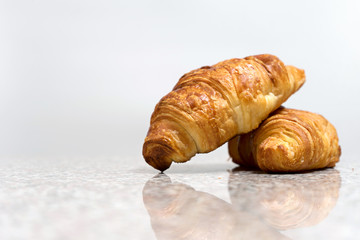 croissant bakery on gray marble table