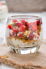 Strawberry , granola and yogurt healthy breakfast parfait