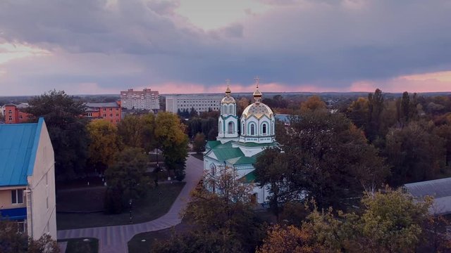 Aerial view on Mirgorod city, Ukraine. Old video style, low light evening sunset autumn footage