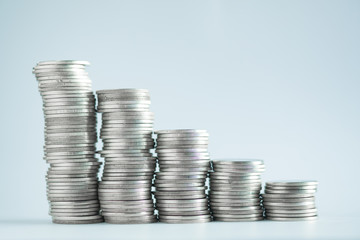 Stacks of coins on working table, finance and business concept, shallow focus..