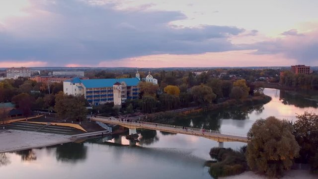 Aerial view on Mirgorod city, Ukraine. Old video style, low light evening sunset autumn footage