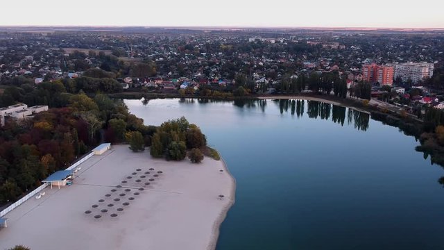 Aerial view on Mirgorod city, Ukraine. Old video style, low light evening sunset autumn footage