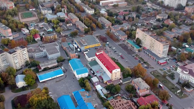 Aerial view on Mirgorod city, Ukraine. Old video style, low light evening sunset autumn footage