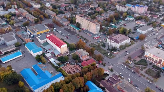 Aerial view on Mirgorod city, Ukraine. Old video style, low light evening sunset autumn footage