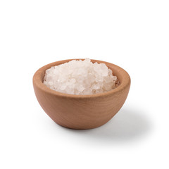Sea salt in wooden bowl on white background with clipping path