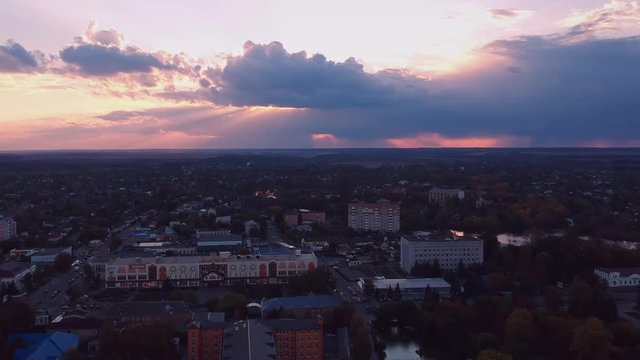 Aerial view on Mirgorod city, Ukraine. Old video style, low light evening sunset autumn footage