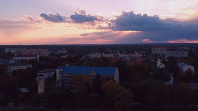 Aerial view on Mirgorod city, Ukraine. Old video style, low light evening sunset autumn footage