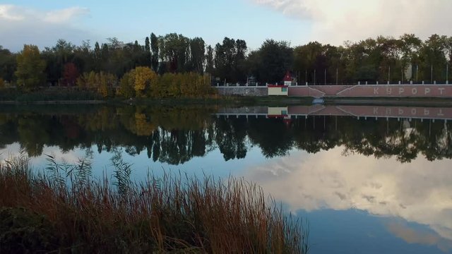 Aerial view on Mirgorod city, Ukraine. Old video style, low light evening sunset autumn footage
