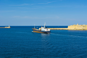 Cargo ship leaves the harbor