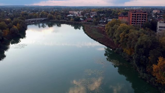 Aerial view on Mirgorod city, Ukraine. Old video style, low light evening sunset autumn footage