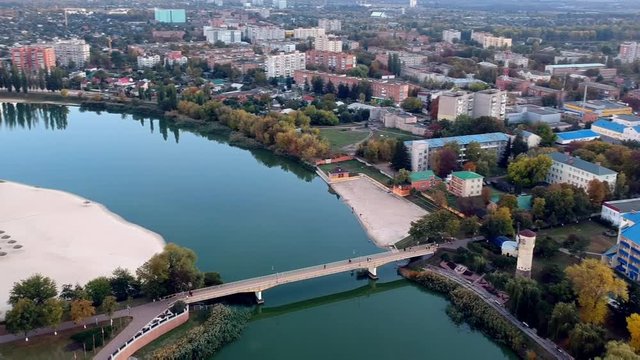 Aerial view on Mirgorod city, Ukraine. Old video style, low light evening sunset autumn footage