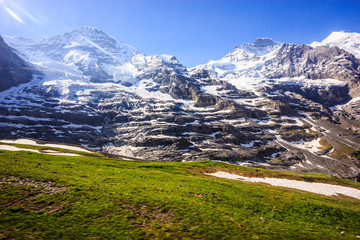 Fototapeta na wymiar Majestic Natural European Swiss Alpine Scenery Background, Jungfrau Region, Lauterbrunnen, Bernese Oberland, Bern Canton, Switzerland, Europe.