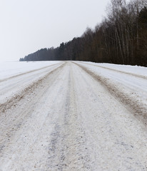 Obraz na płótnie Canvas Road in winter, a close-up