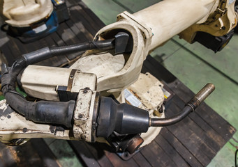 The old Robots welding machine in a car factory
