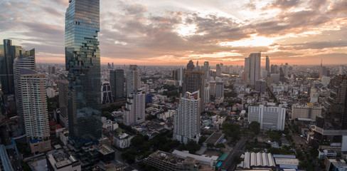Dusk Over Skyscrapers In Downtown Bangkok, Thailand, Aerial Panorama Shot