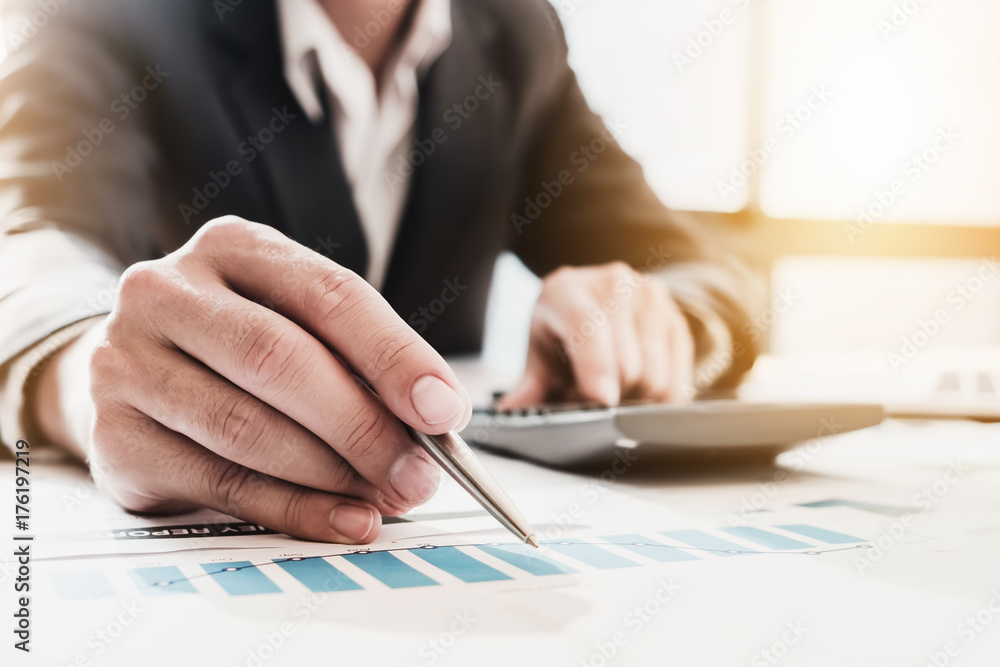 Poster businessman pen pointing graph chart in this mounth and use calculator for plans to improve quality 