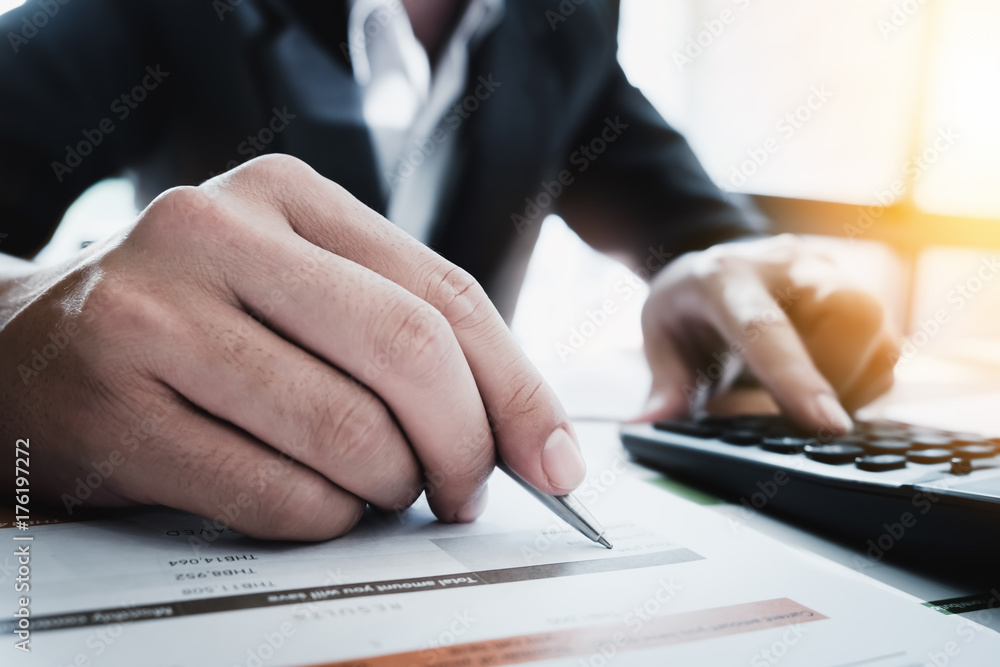 Poster businessman pen pointing graph chart in this month and use calculator for plans to improve quality n
