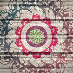Decorative design element. Patterns with geometric ornament. Circular ornamental symbol. Asian ornamental motifs. Grunge concrete wall and wooden planks texture