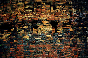 Old brick wall texture on the street