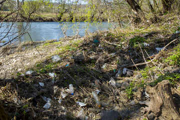Fototapeta na wymiar the trash by the river