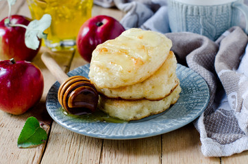 Pancakes with apples and honey, breakfast