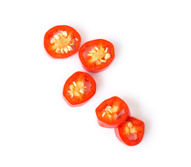 Closeup top view red chili pepper with sliced on white background, raw food ingredient concept