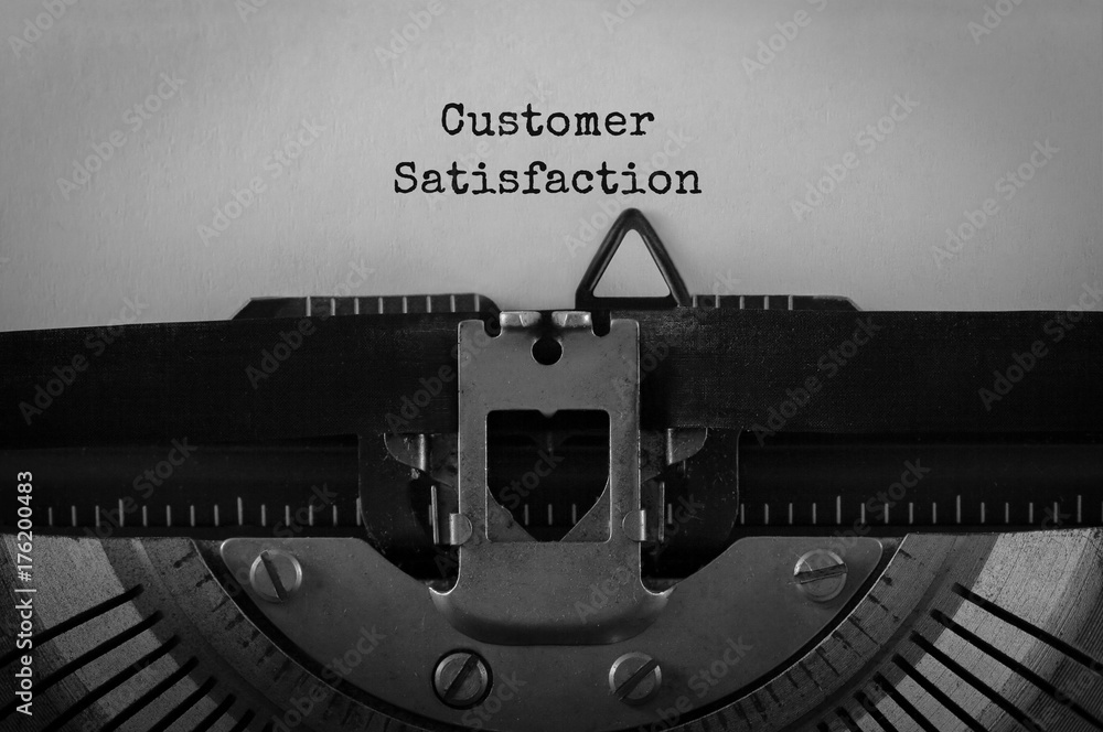 Poster text customer satisfaction typed on retro typewriter