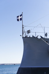 Thessaloniki, Greece Greek warship Averof moored at port with Greek flag waving.
Launched in 1910,...
