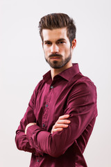 Studio shot portrait of young angry businessman. 