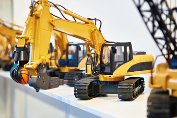 Toy excavators in store