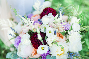 Obraz na płótnie Canvas Wedding bouquet, flowers on green grass